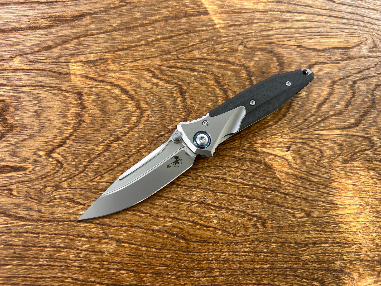 Microtech Socom Bravo Mini Manual Folding Knife 3.5" M390 Blasted Clip Point Plain Blade, Bolstered Titanium Handles with Carbon Fiber Scales, Frame Lock - 260M-7CFTI