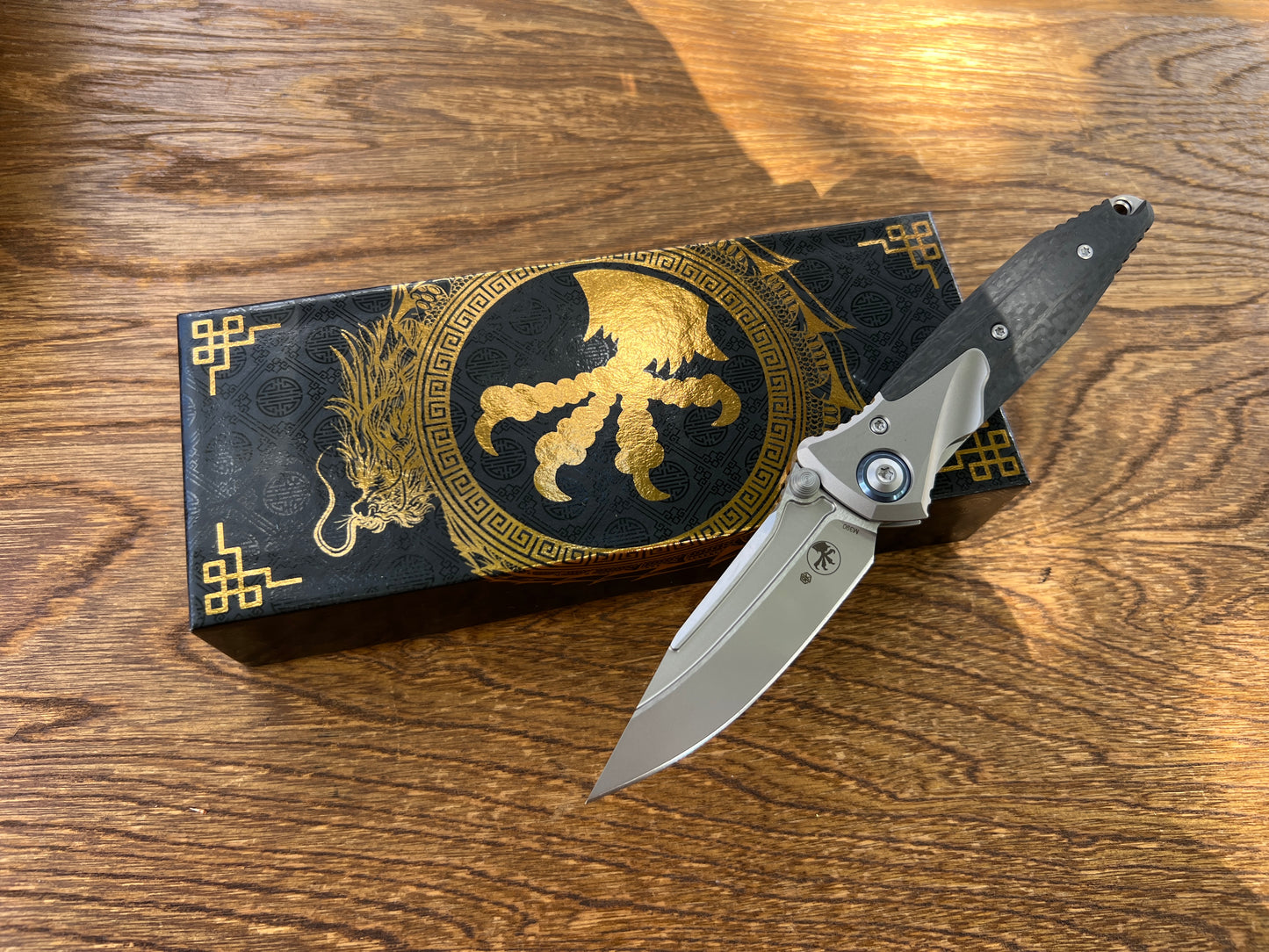 Microtech Socom Bravo Mini Manual Folding Knife 3.5" M390 Blasted Clip Point Plain Blade, Bolstered Titanium Handles with Carbon Fiber Scales, Frame Lock - 260M-7CFTI
