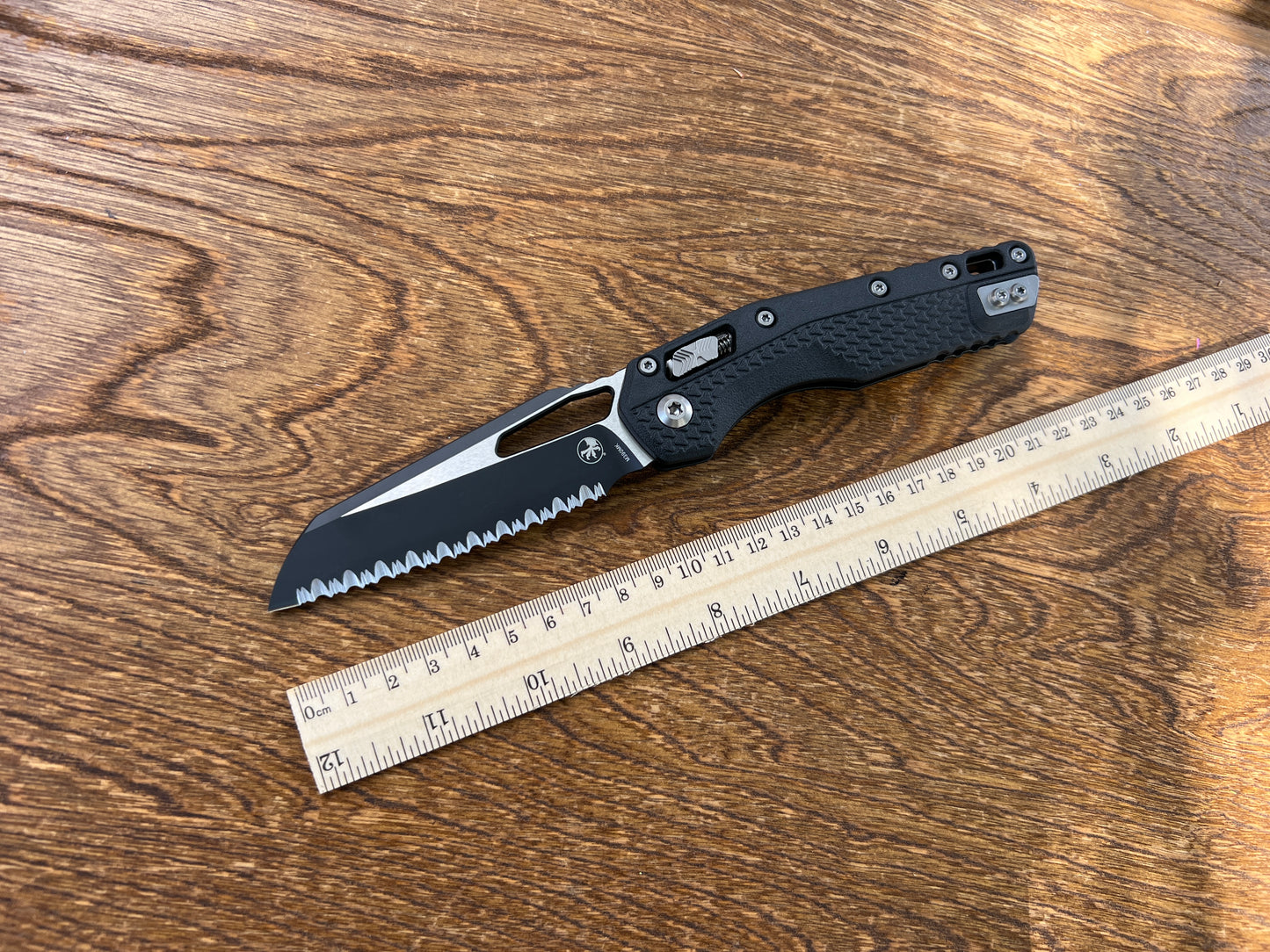 Microtech 210T-3PMBK MSI RAM-LOK Manual Folding Knife 3.88" Bohler M390MK Black Modified Sheepsfoot Combo Blade, Black Injection Molded Polymer Handles, AXIS/Crossbar Lock