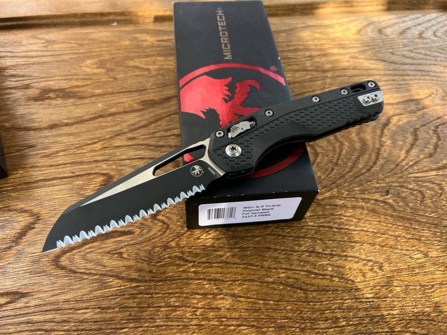 Microtech 210T-3PMBK MSI RAM-LOK Manual Folding Knife 3.88" Bohler M390MK Black Modified Sheepsfoot Combo Blade, Black Injection Molded Polymer Handles, AXIS/Crossbar Lock