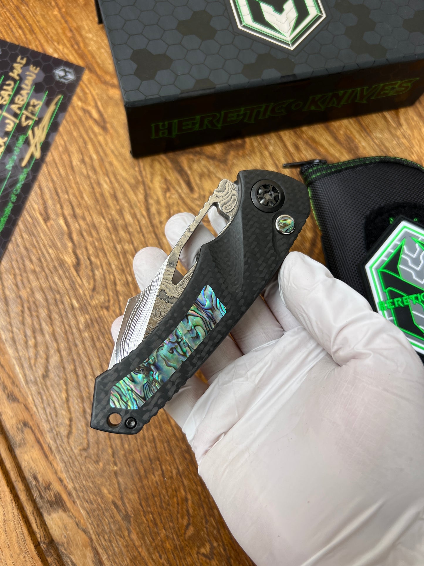 Heretic Knives Pariah Custom M/A Button Lock Carbon Fiber & Abalone Inlay w/ Vegas Forge Wood Grain San Mai Damascus